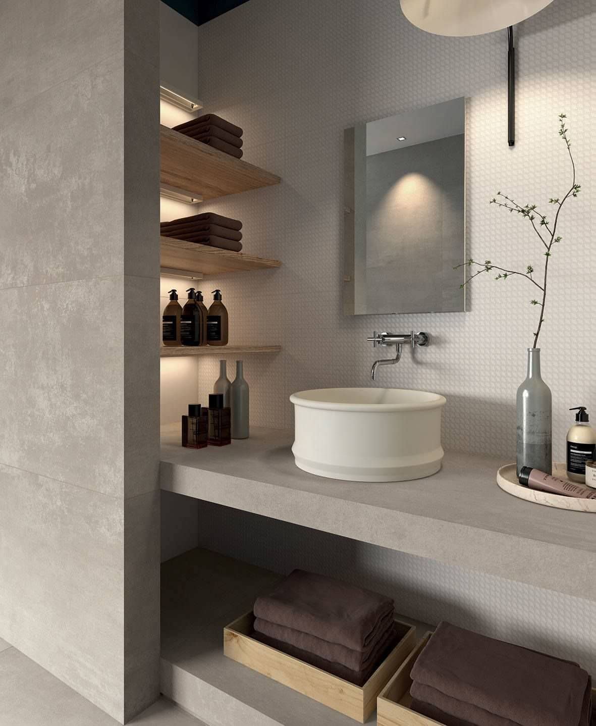 Masonry bathroom project with a full-height niche on the side of the sink.  Wooden tops with led lighting.