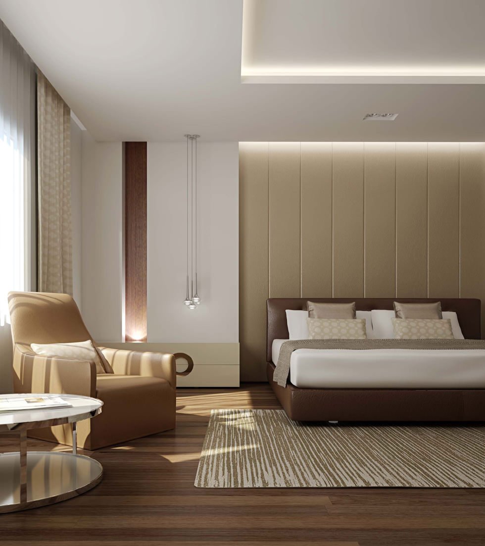 Interesting lighting for this modern bedroom with the use of a led profile that interacts with the wise choice of the colors of the furniture (brown and cream).  The light draws harmonious lines that enhance the sweet atmosphere of the room.  Wooden floors.