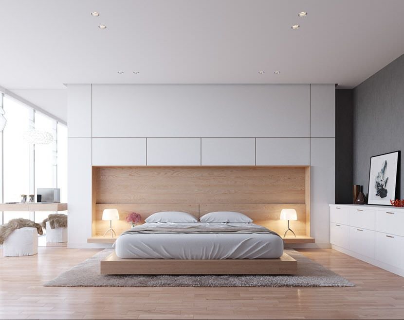 Warm and cozy modern bedroom - wooden floor, headboard and bed frame - white and gray color - mirrors to widen the visual space