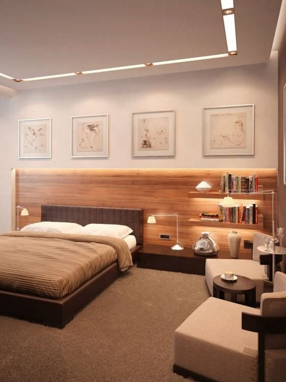 Small bedroom image with the headboard embedded in the wall - wood and white