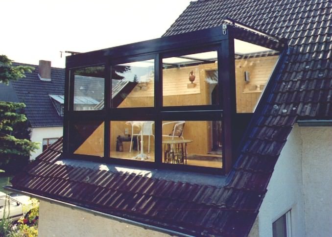 Idee attico - estensione moderna realizzata da una struttura in alluminio e vetro