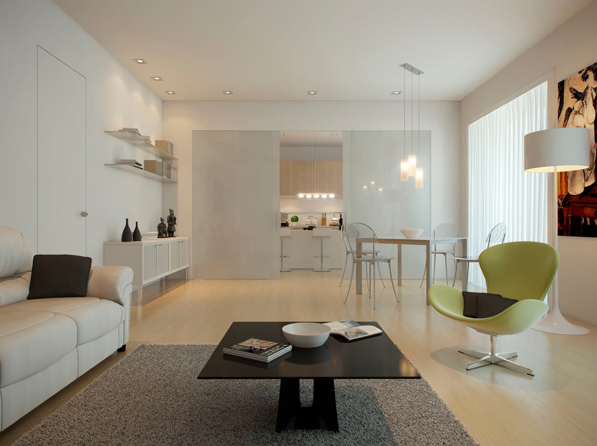 Design open space contemporaneo minimal in cui spicca la soluzione per la chiusura della cucina con una vetrata opaca scorrevole che la nasconde ma lascia passare la luce - soffitto con faretti da incasso