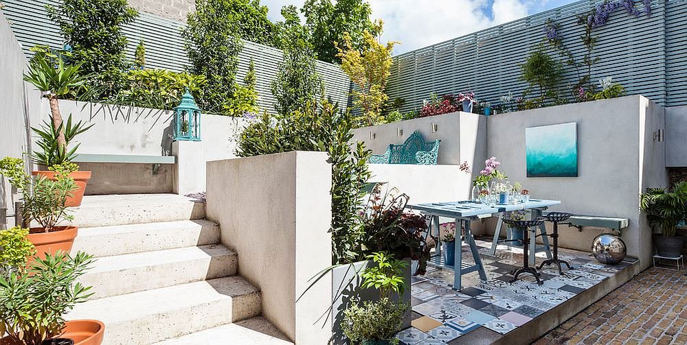 Terrazzo eclettico con sapore mediterraneo grazie al pavimento patchwork - idea disegno cementine